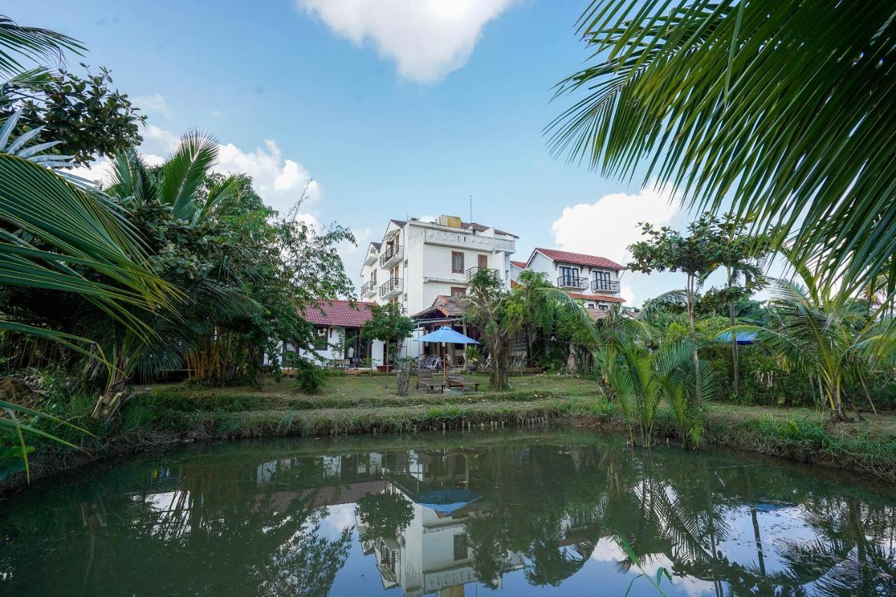 Windy River Homestay Хойан Экстерьер фото
